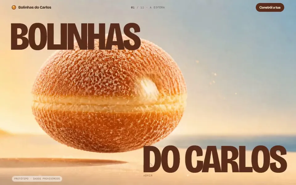Captura da maqueta Bolinhas do Carlos: uma bolinha dourada gigante na praia, com o nome em letras grandes.